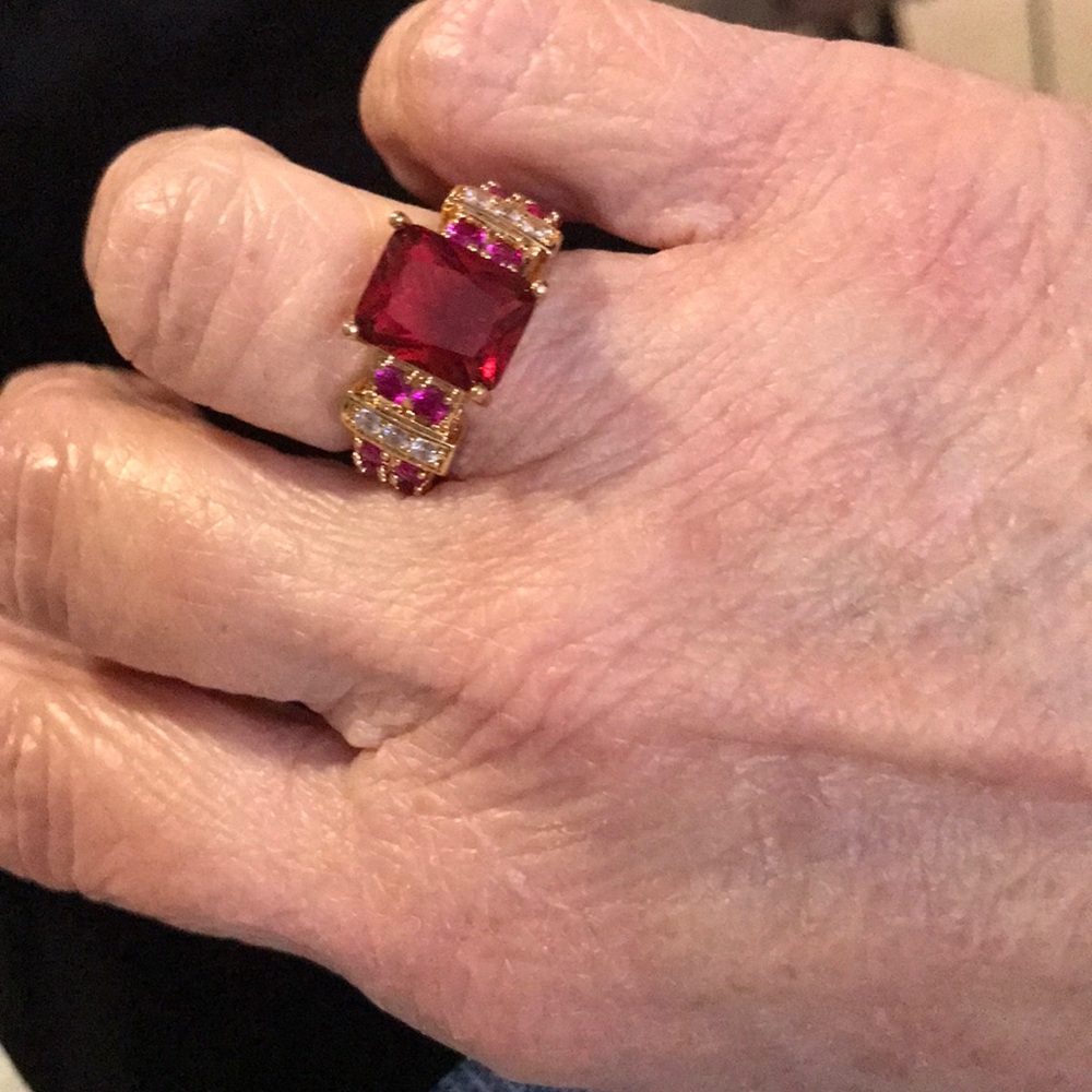 Red and clear colored stone ring.